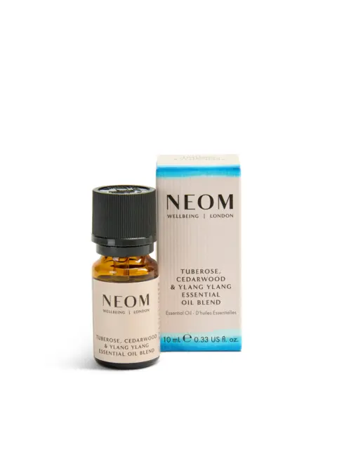 Neom essential oil blend, tuberose, cedarwood, ylang ylang, 10ml bottle and box.
