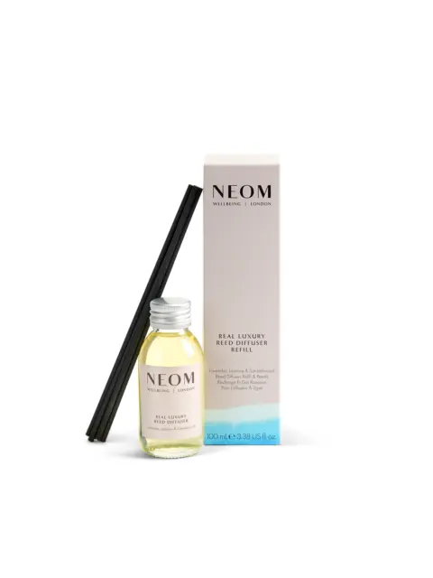 NEOM Real Luxury Reed Diffuser Refill with reeds, 100 ml bottle and packaging.