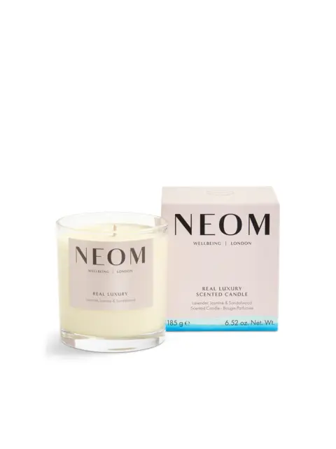 NEOM Real Luxury scented candle with lavender, jasmine, and sandalwood. Box and candle shown.