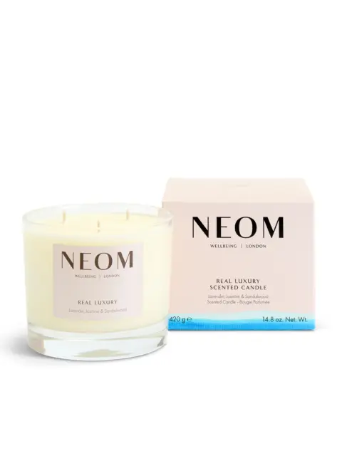 NEOM Real Luxury scented candle with lavender, jasmine, and sandalwood. Box and candle shown.