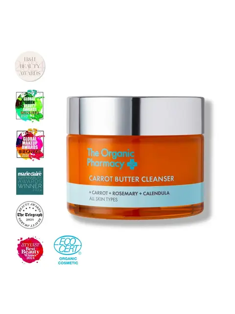 The Organic Pharmacy Carrot Butter Cleanser jar with award logos.