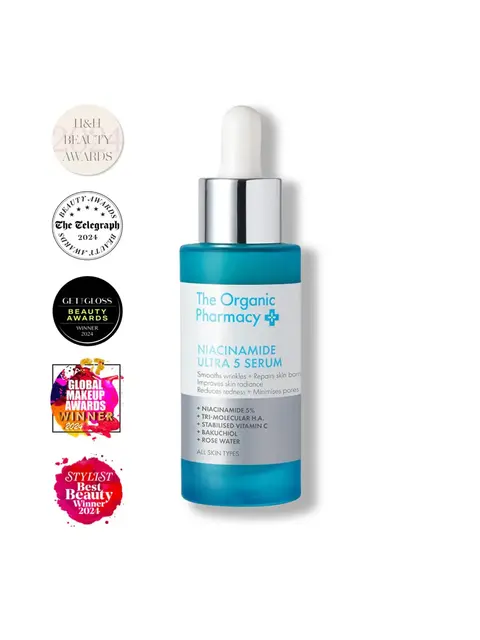 The Organic Pharmacy Niacinamide Ultra 5 Serum with award badges on the left.