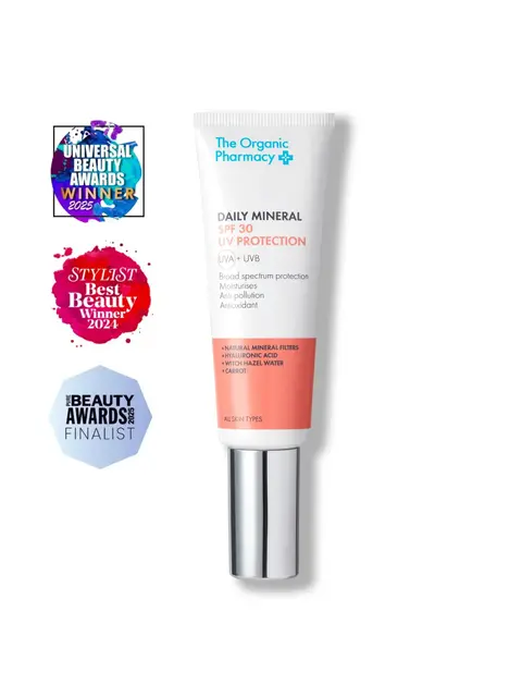The Organic Pharmacy Daily Mineral SPF 30 tube with award badges.