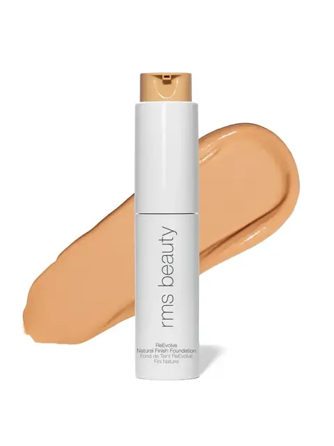RMS Beauty foundation bottle with beige swatch behind.
