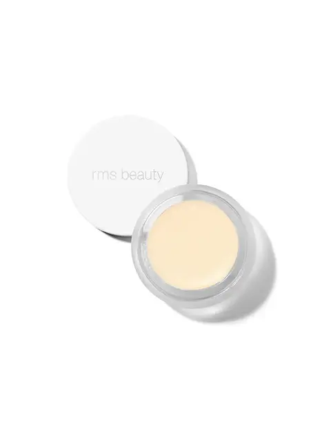Open jar of cream with "rms beauty" on the lid, white background.