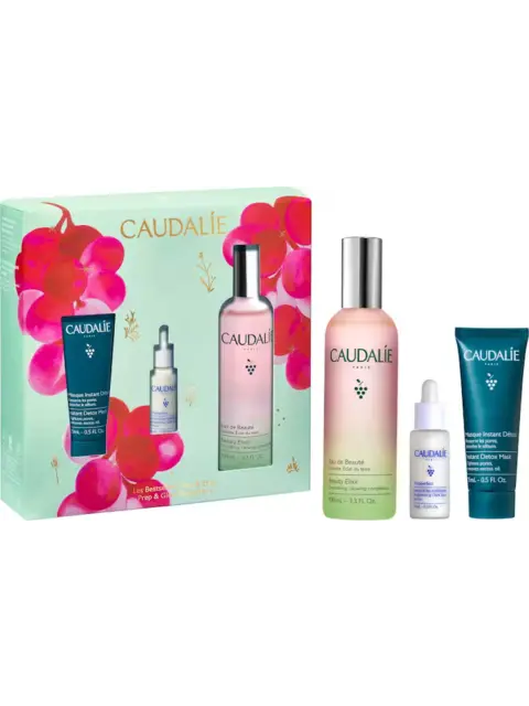 Caudalie skincare gift set with beauty elixir, serum, and detox mask.