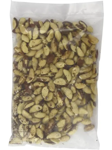 Sealed plastic bag filled with whole Brazil nuts.