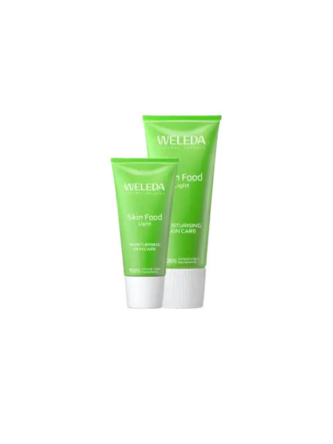 Two green tubes of Weleda Skin Food Light moisturising skincare.