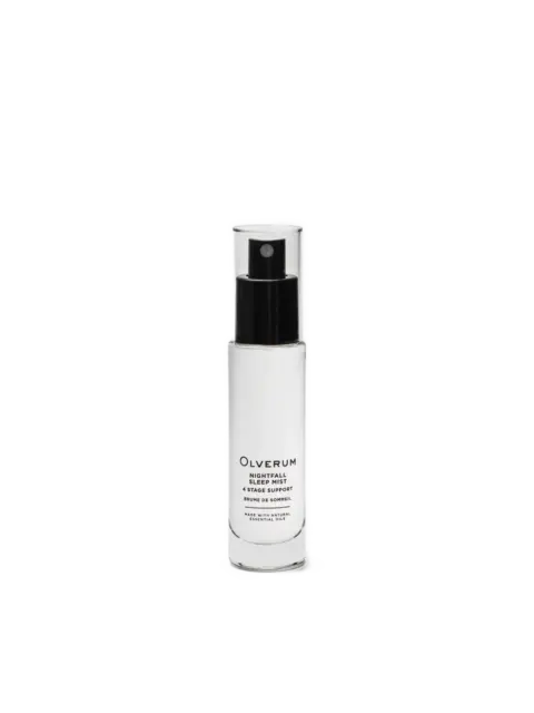 Clear bottle of Olverum Nightfall Sleep Mist with black spray top.