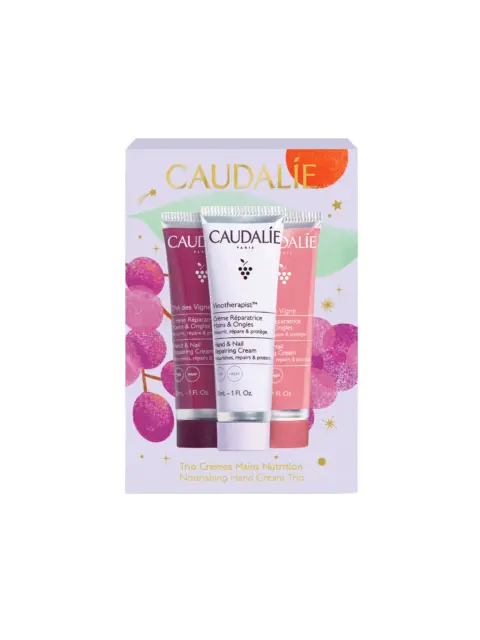 Caudalie hand cream trio with grape design packaging.