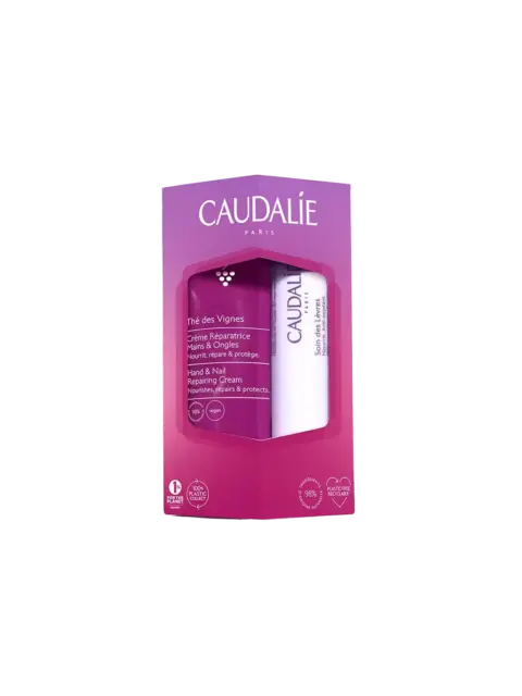 Caudalie gift set with hand cream and lip balm in purple packaging.