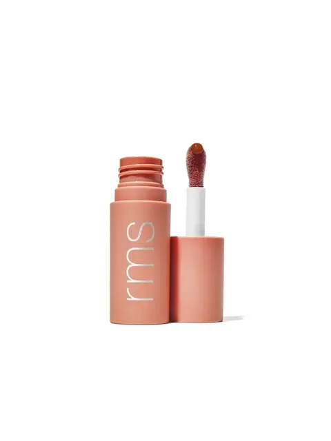 Peach-coloured lip gloss tube with "rms" text, open with applicator.
