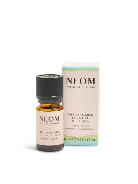 Neom Feel Refreshed Essential Oil Blend, lemon and fresh basil, 10ml bottle and box.
