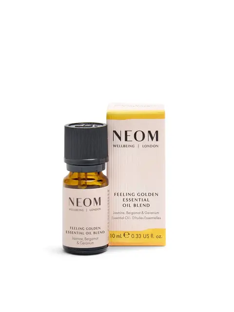 NEOM Feeling Golden Essential Oil Blend, 10ml bottle and box, jasmine, bergamot, geranium.