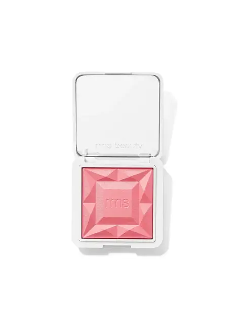 Open compact with pink blush and "rms" embossed on the surface.