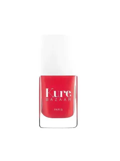Kure Bazaar red nail polish bottle with white cap.