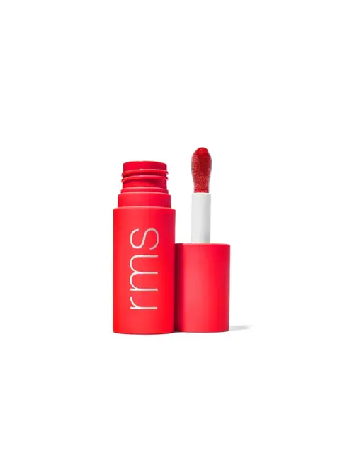 Red lipstick tube with "rms" text, open with applicator showing red lip colour.