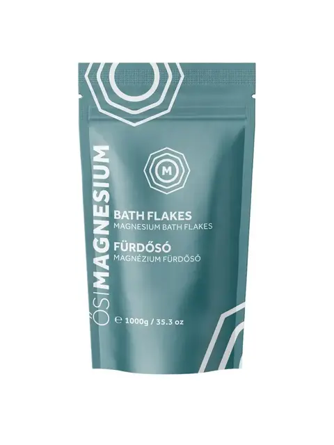 Teal packet of magnesium bath flakes, 1000g, with white geometric design.