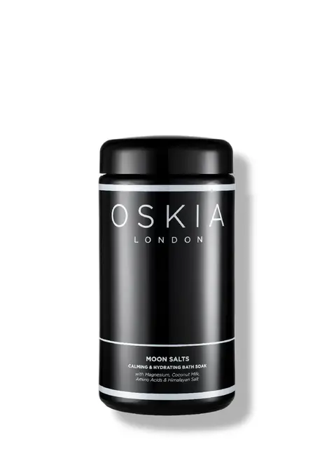 Oskia London Moon Salts, calming bath soak with magnesium and Himalayan salt, in black jar.