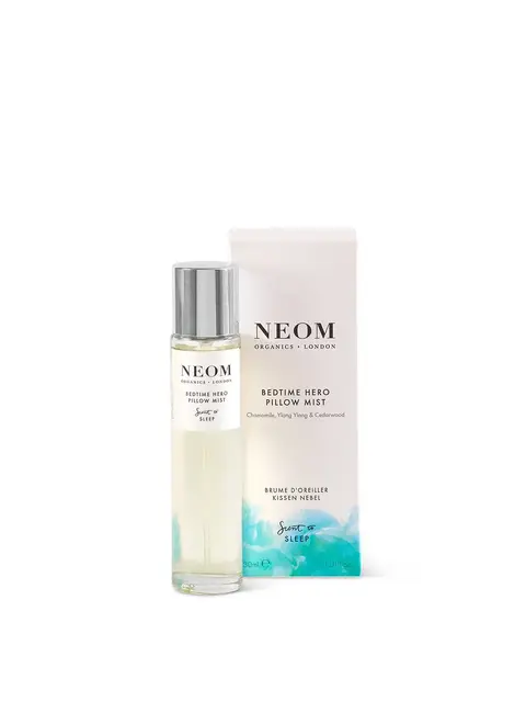 Neom Bedtime Hero Pillow Mist bottle and box, 30ml, chamomile, ylang ylang, cedarwood.