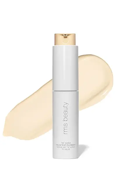 RMS Beauty foundation bottle with beige liquid swatch behind.