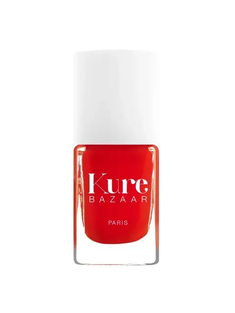 Kure Bazaar red nail polish bottle with white cap.