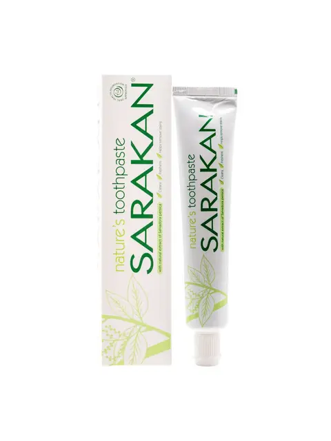 Sarakan toothpaste tube and box with green leaf design and text.