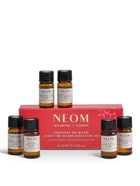 NEOM essential oil set with six bottles and red box.