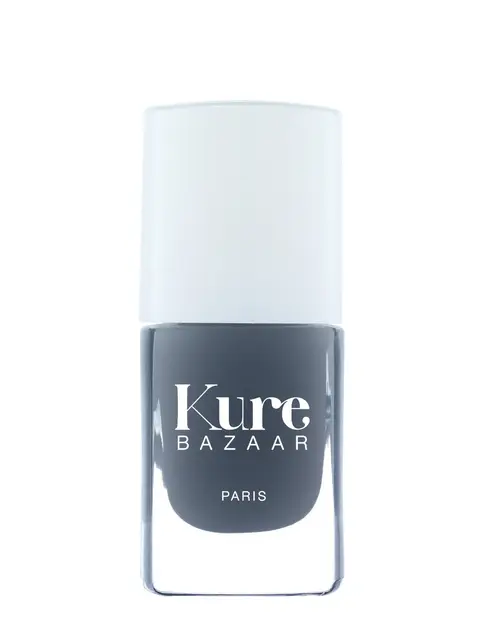 Kure Bazaar grey nail polish bottle with white cap.