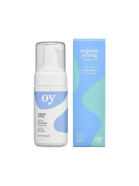 Foaming face wash bottle and box, labelled "oy" and "organic young" with tea tree and willow bark.