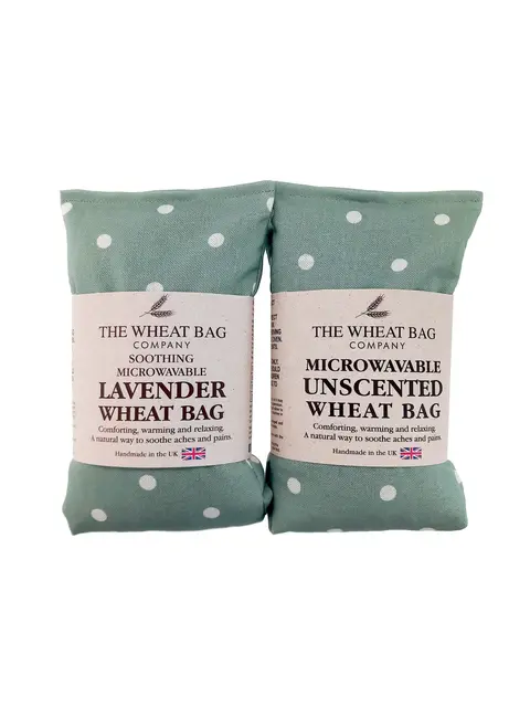 Two green polka dot wheat bags, lavender and unscented, by The Wheat Bag Company.