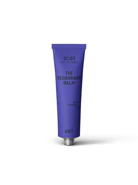 Purple tube labelled "The Deodorant Balm" by AKT, scent: Vetiver, Lavandin, Yuzu.