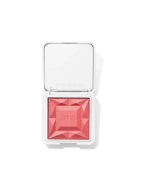 Open compact with pink blush, embossed "rms" in centre, white case.