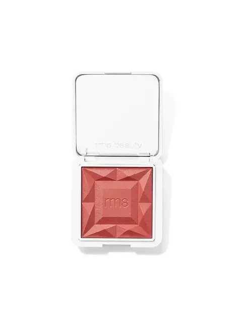 Open compact with red blush and "rms beauty" embossed on the lid.