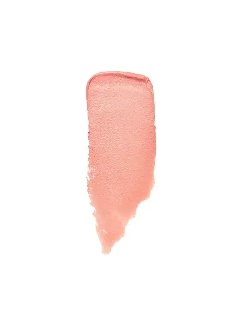 Peach-coloured lipstick smear on white background.