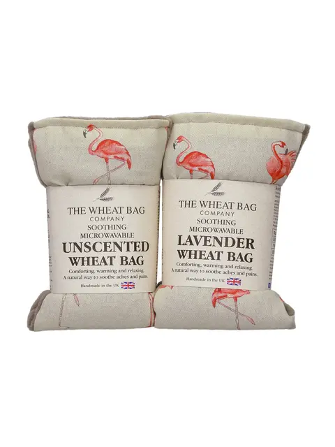 Two wheat bags with flamingo design, labelled unscented and lavender. Made in the UK.