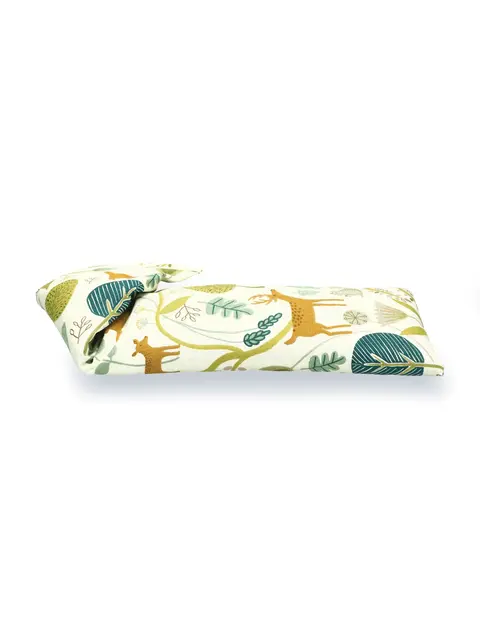Cream eye pillow with deer and leaf pattern in green and brown.