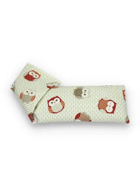 Cream eye pillow with red and brown owl pattern.