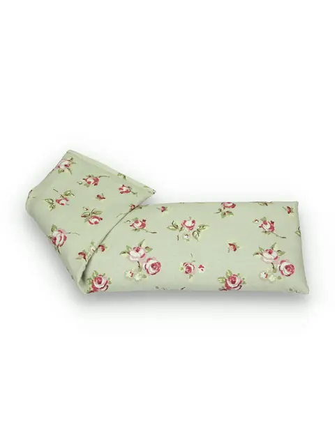 Green floral-patterned fabric eye pillow with pink roses.