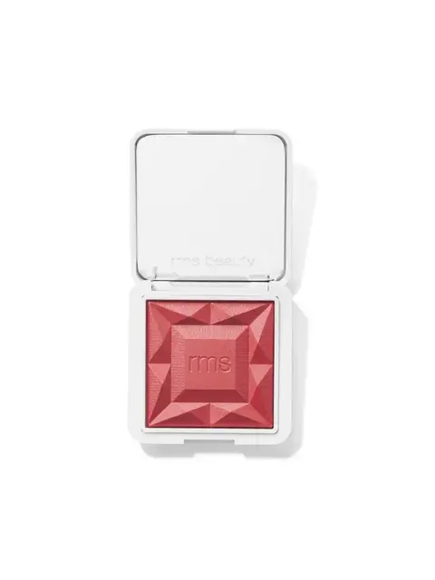 Open compact with red blush and embossed "rms" logo.