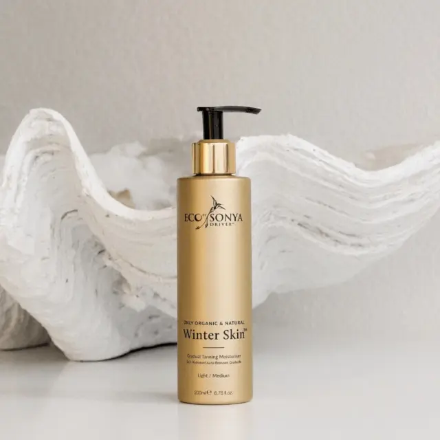 Eco by Sonya Winter Skin moisturiser bottle on white textured background.