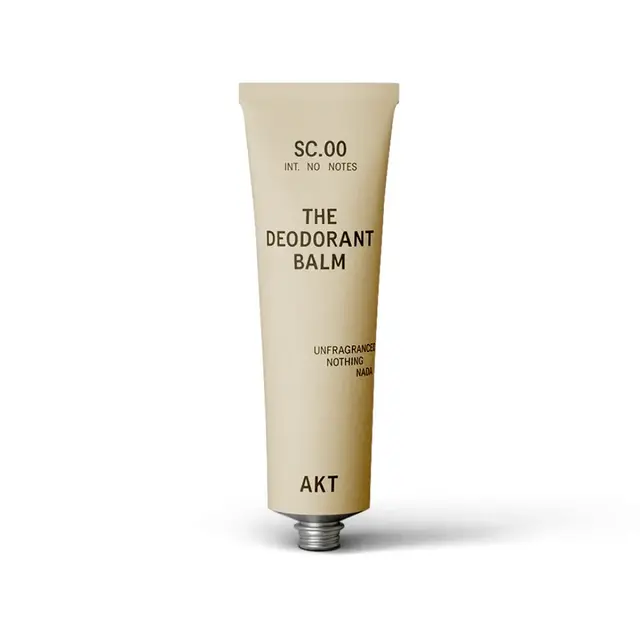 Beige tube labelled "The Deodorant Balm" by AKT, unfragranced.