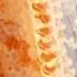 Close-up of honeycomb with golden honey oozing from hexagonal cells.