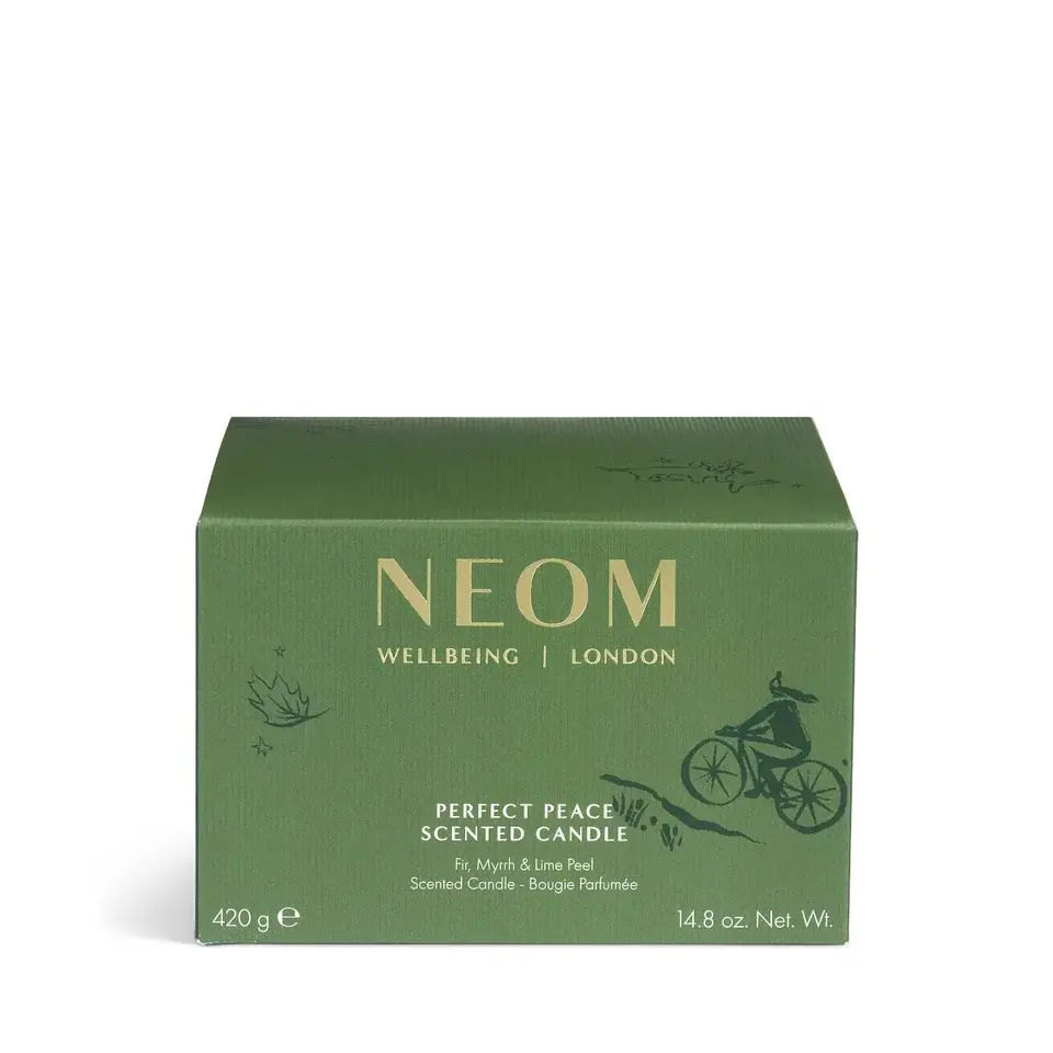 Green box of NEOM Perfect Peace scented candle, 420g, with bicycle illustration.