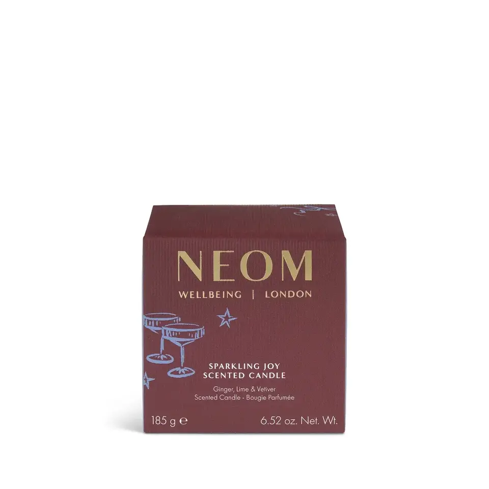 Red box of NEOM Sparkling Joy scented candle, 185g, ginger, lime, vetiver.