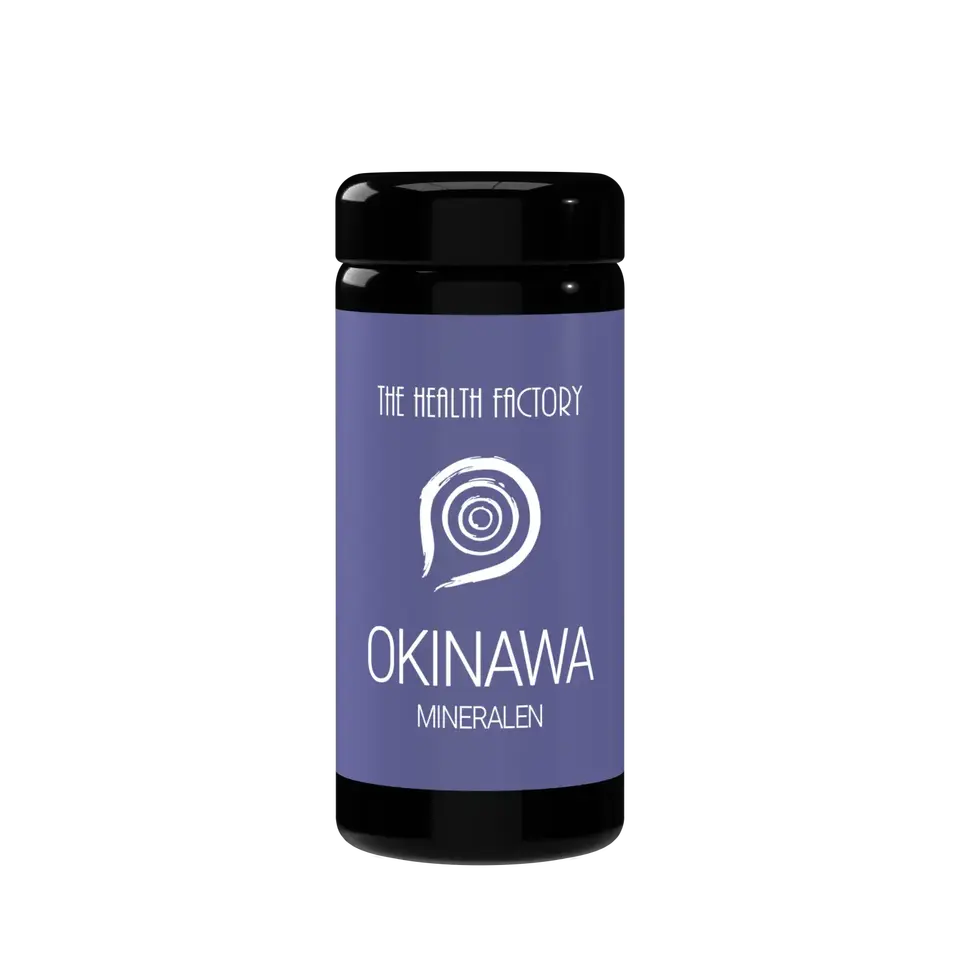 Black bottle with purple label, "The Health Factory Okinawa Mineralen" text and spiral design.