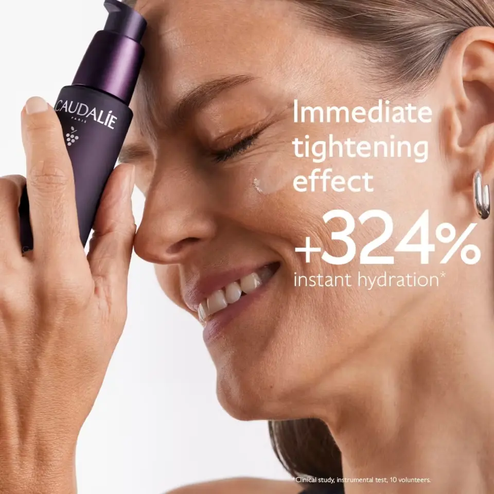 Woman applying Caudalie serum, text: "Immediate tightening effect, +324% instant hydration".