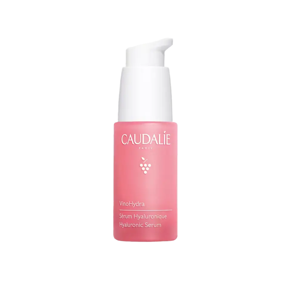 Caudalie VinoHydra Hyaluronic Serum in a pink bottle with a white pump.