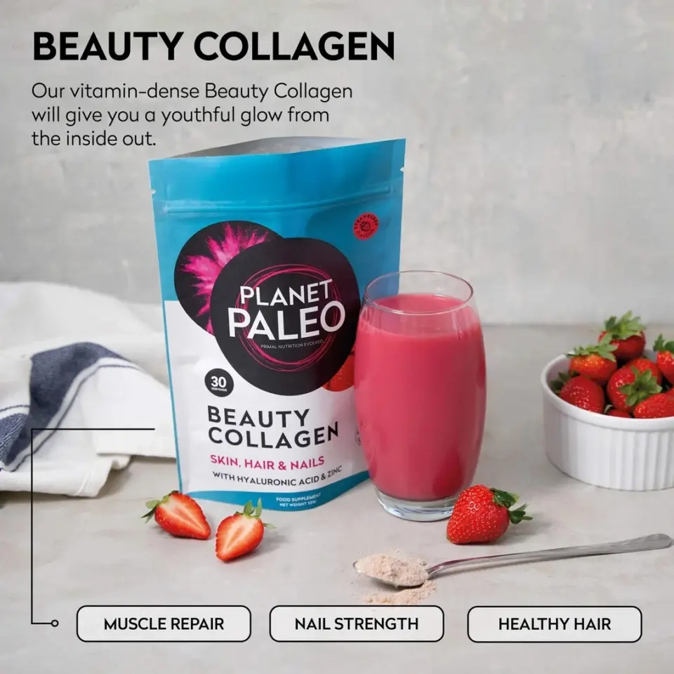 Planet Paleo Beauty Collagen pack with pink drink, strawberries, and spoon on table.