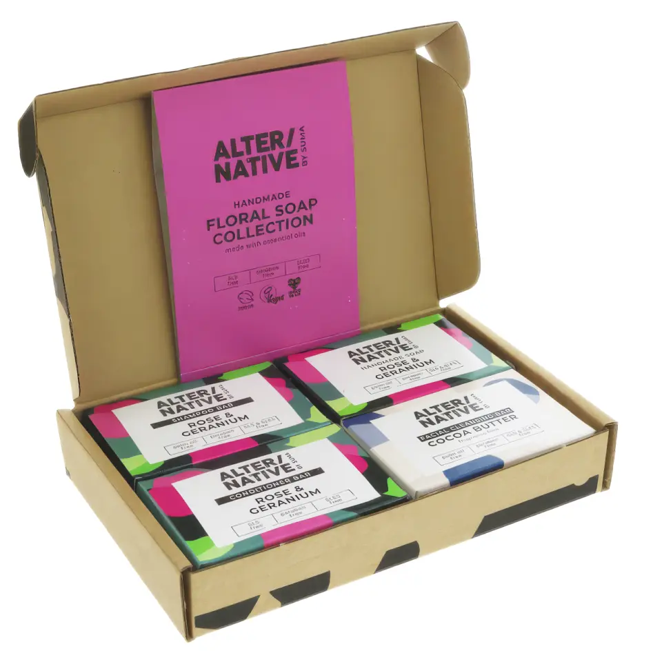 Open box with four bars of soap labelled "Rose & Geranium" and "Cocoa Butter".